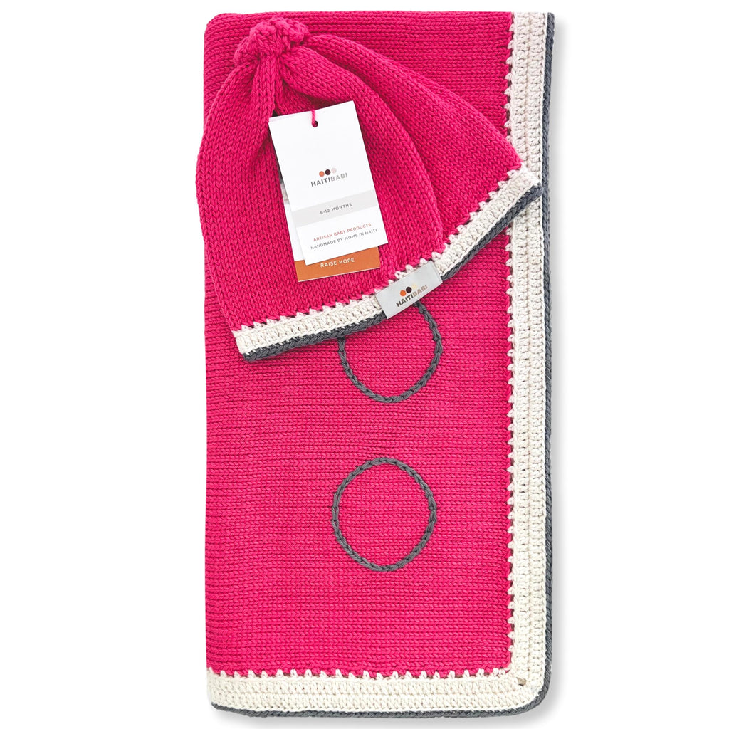 Peony pink knit baby blanket & hat gift set handmade by women artisans in Haiti